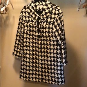 Long, 2 pocket suit jacket in excellent condition.